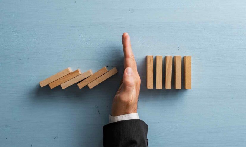 overhead-view-of-hand-in-a-business-suit-stopping-2026-01-08-02-23-53-utc (1)