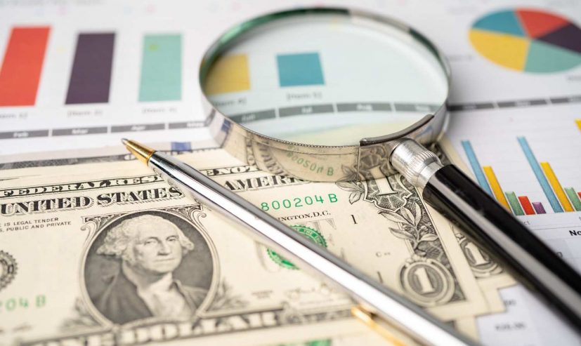 magnifying-glass-on-graph-paper-2026-01-08-06-06-56-utc