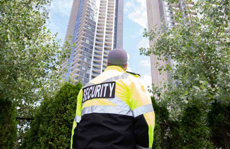 security-guard-in-uniform-patrolling-a-residential-2026-03-18-09-51-14-utc (1)