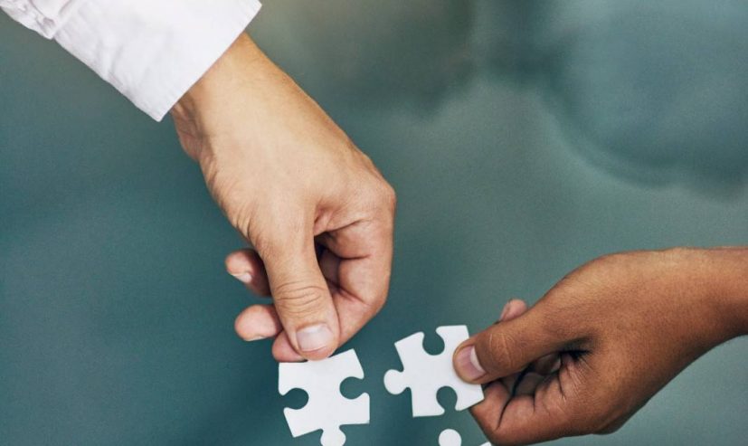 we-fit-together-as-a-team-shot-of-hands-putting-p-2026-03-25-04-48-34-utc (1)