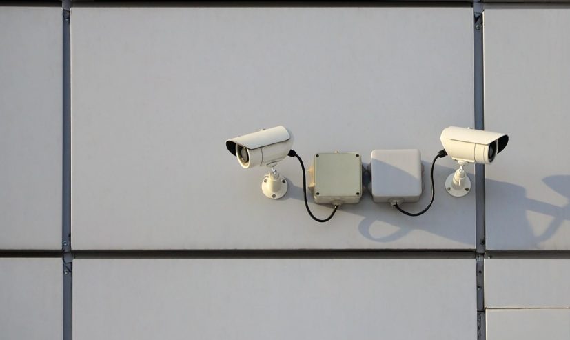 white-surveillance-camera-built-into-the-metal-wal-2026-03-24-23-52-02-utc (1)